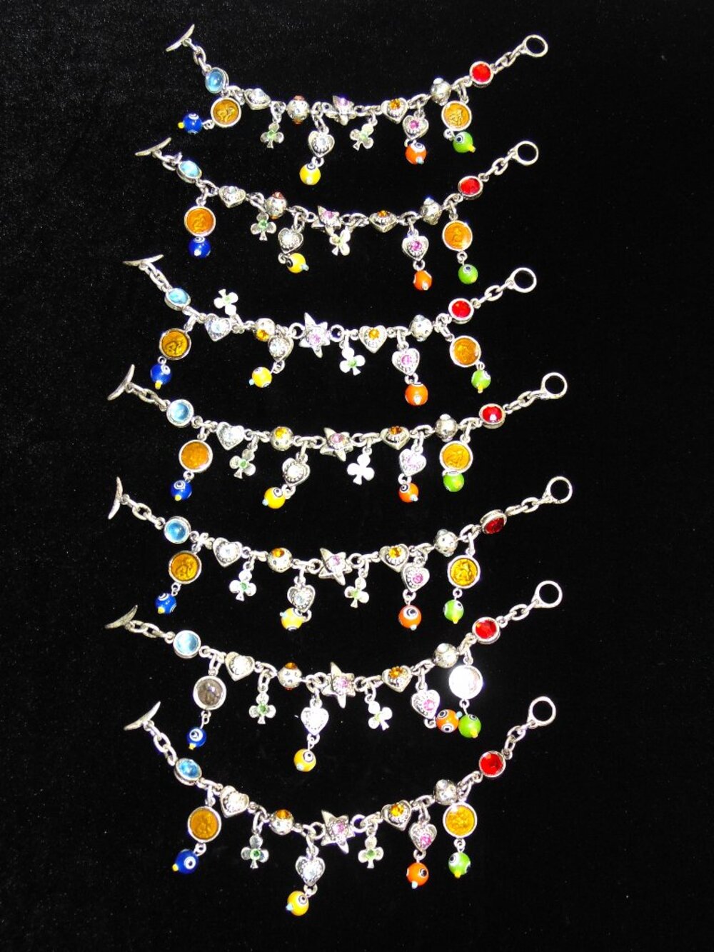 Lot of 7 Charm Style Bracelets- very nice!